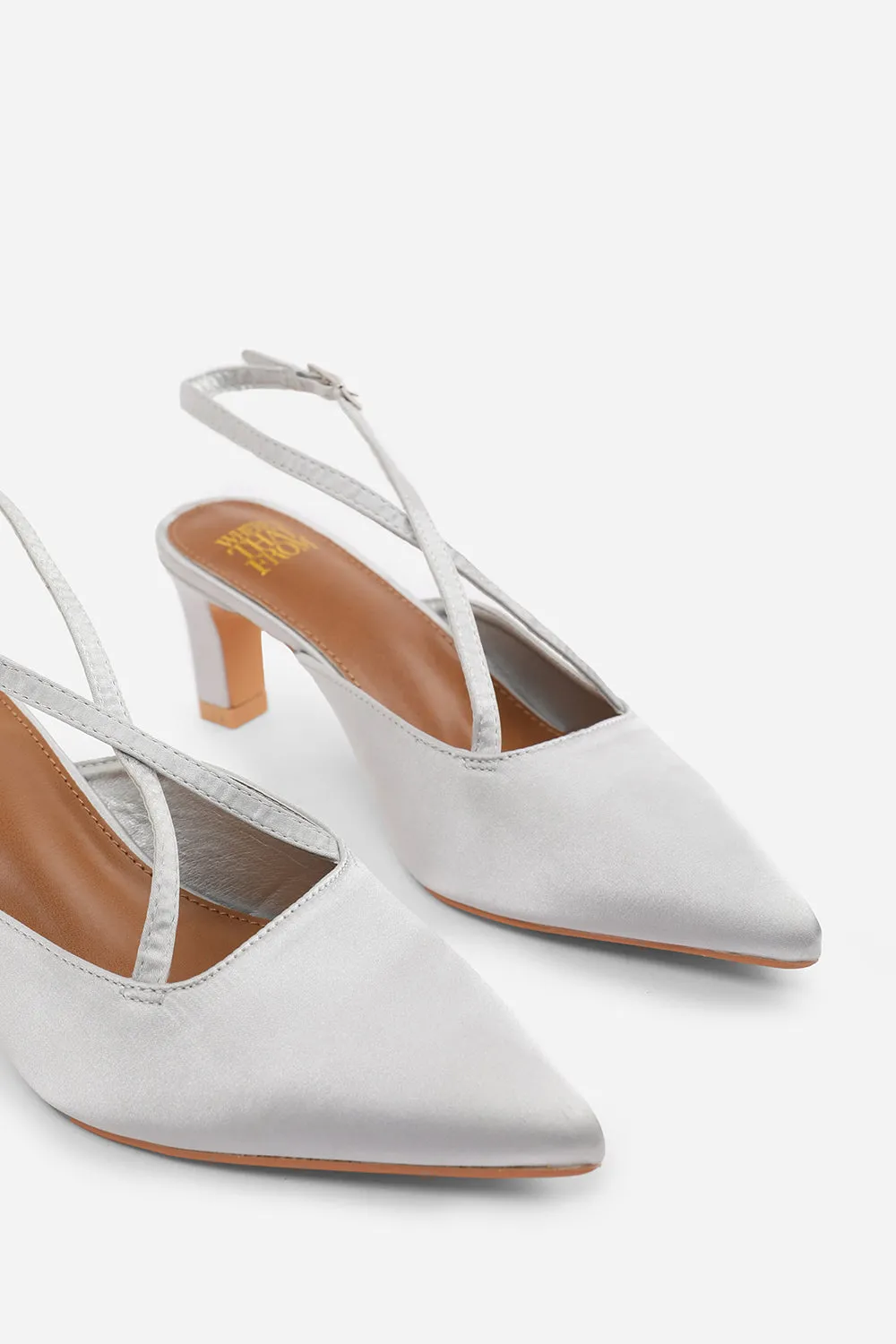 AUSTEN WIDE FIT POINTED TOE LOW BLOCK HEEL WITH CROSS OVER ANKLE STRAP IN SILVER SATIN
